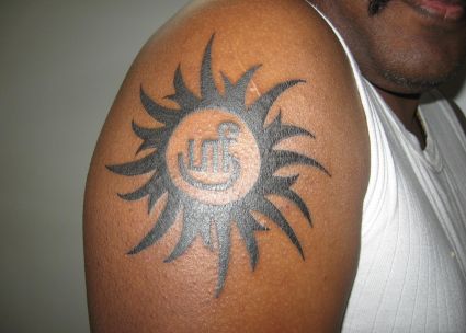 Tribal Sun Shoulder Tattoo Pics